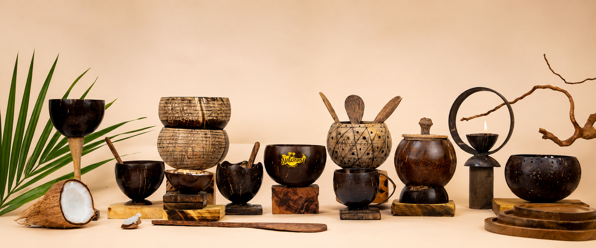 Natchu's handcrafted coconut shell bowls, cups and décor styled with a palm frond